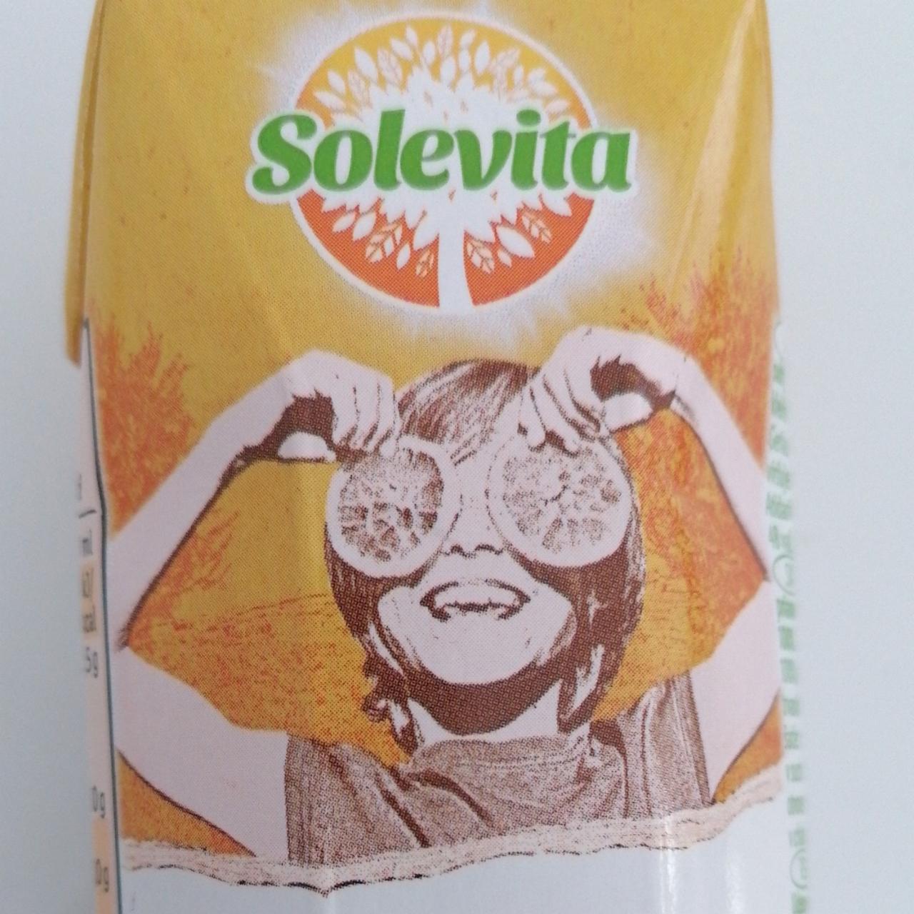 Fotografie - Orange juice pressed from fruits Solevita