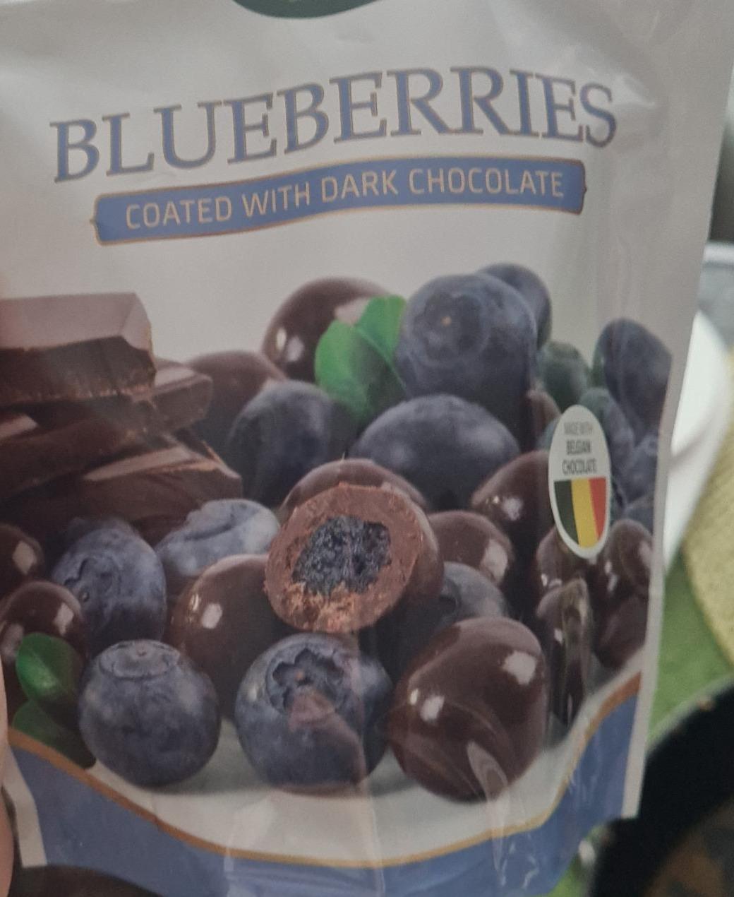 Fotografie - blueberries coated with dark chocolate Rois