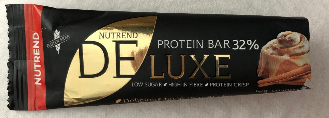 Fotografie - DeLuxe Protein bar 32% Cinnamon roll Nutrend