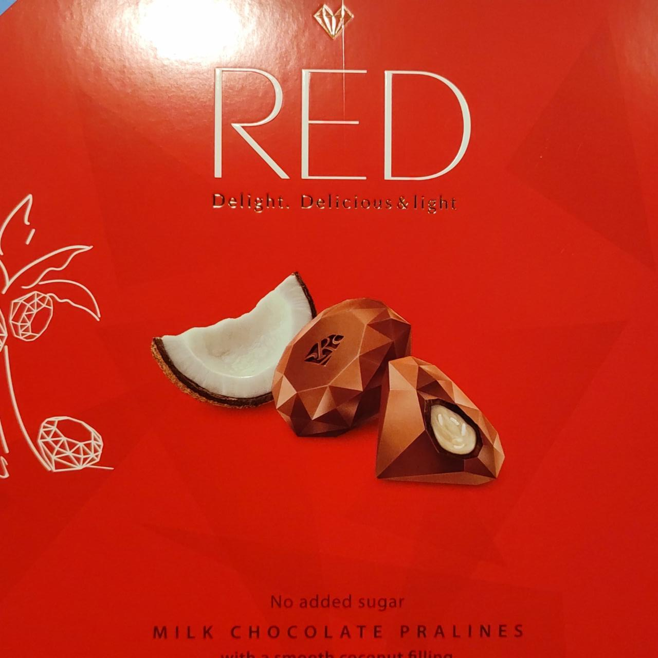 Fotografie - Red Milk chocolate pralines whit a smooth coconut filling