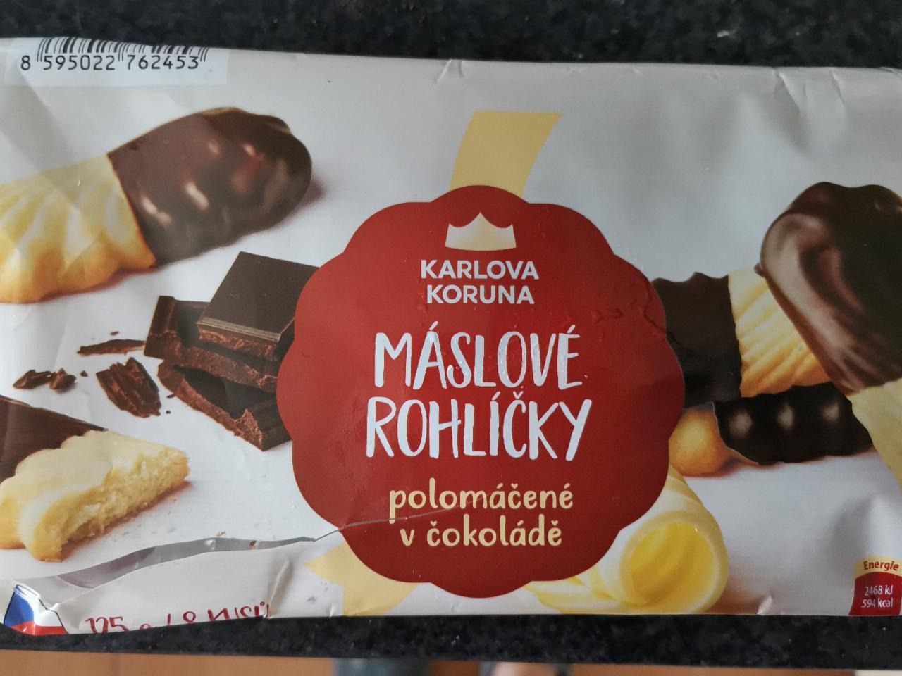 Fotografie - máslové rohlíčky polomáčené v čokoládě