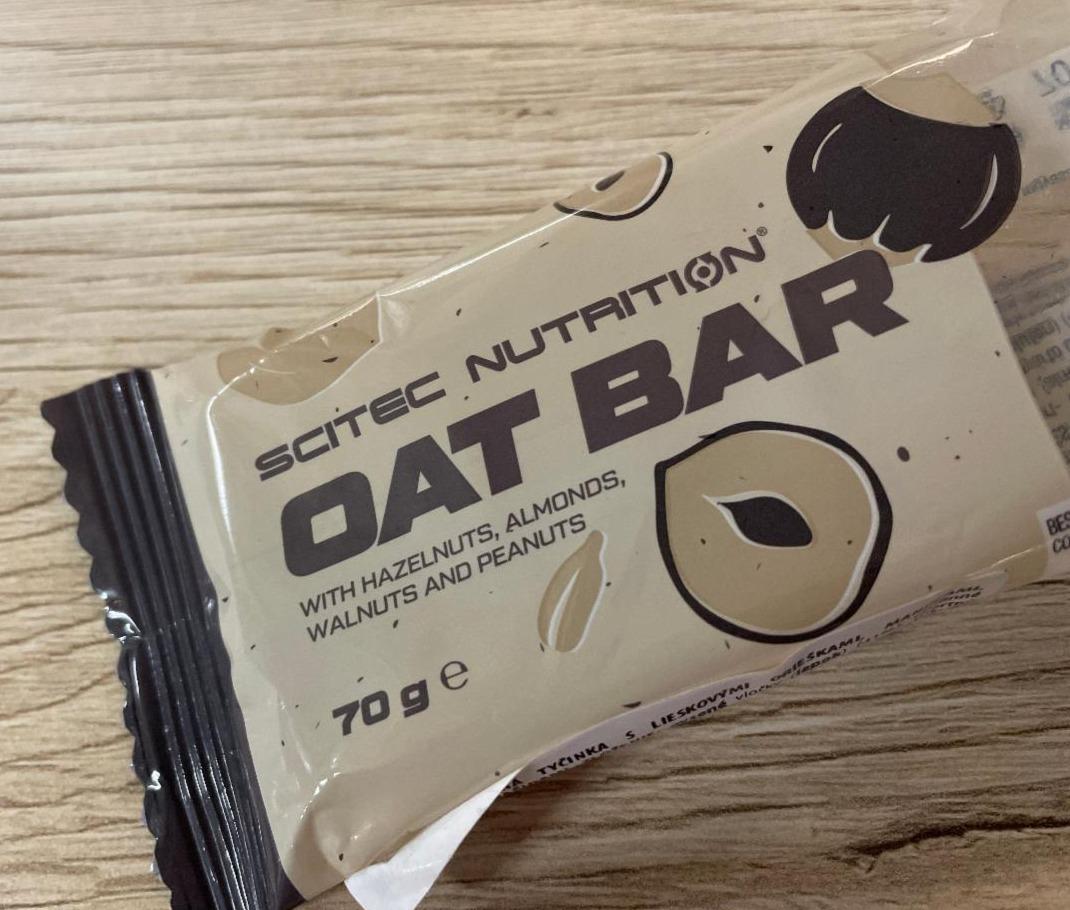 Fotografie - Oat Bar with hazelnuts, almonds, walnuts and peanuts Scitec Nutrition