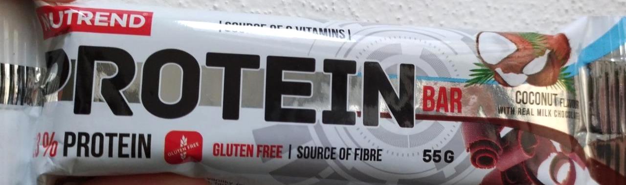 Fotografie - Protein bar 23% coconut flavour with real milk chocolate Nutrend