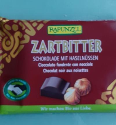 Fotografie - Zartbitter Schokolade mit haselnüssen Rapunzel