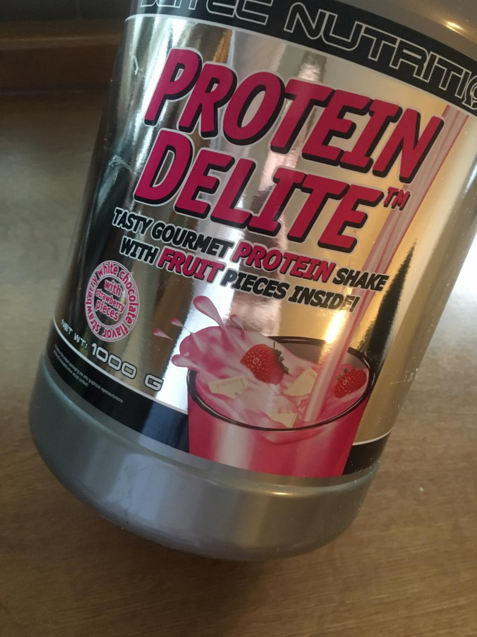 Fotografie - Protein Delite jahoda s kúskami bielej čokolády