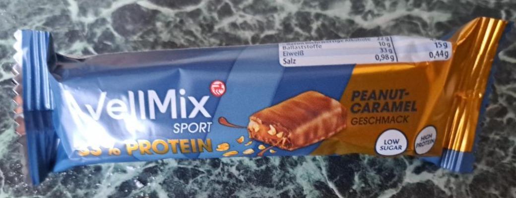 Fotografie - WellMix Sport 33% protein Peanut caramel Rossmann