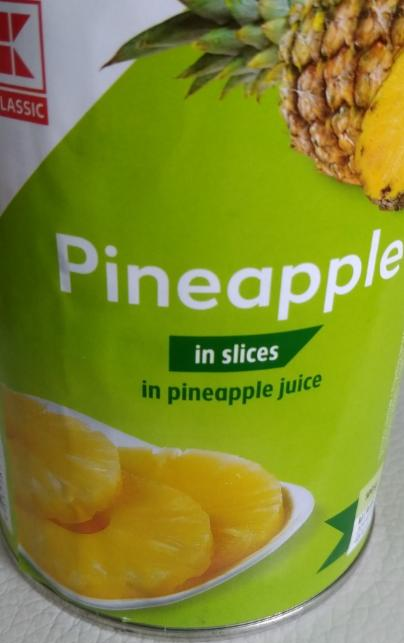 Fotografie - Pineapple in slices in Pineapple juice