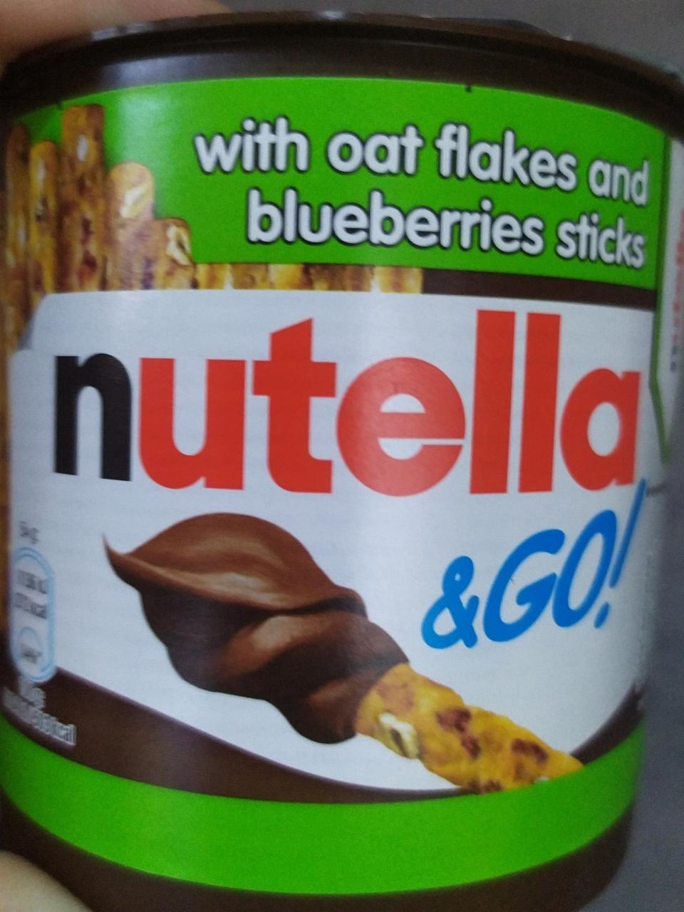 Fotografie - nutella & go with oat flakes and blueberries stick