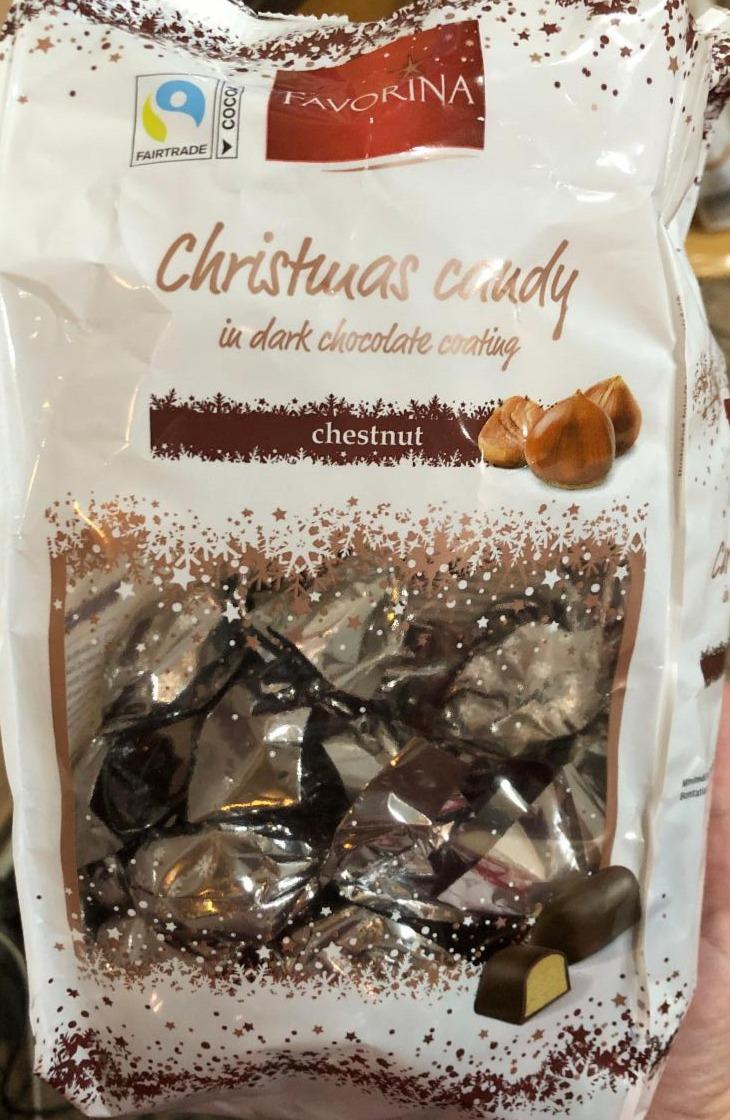 Fotografie - Christmas candy in dark chocolate coating chestnut Favorina