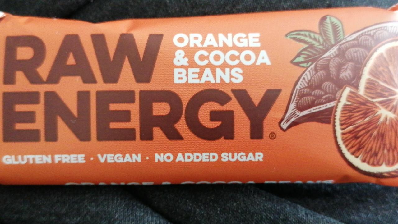 Fotografie - raw energy orange and cocoa beans Bombus