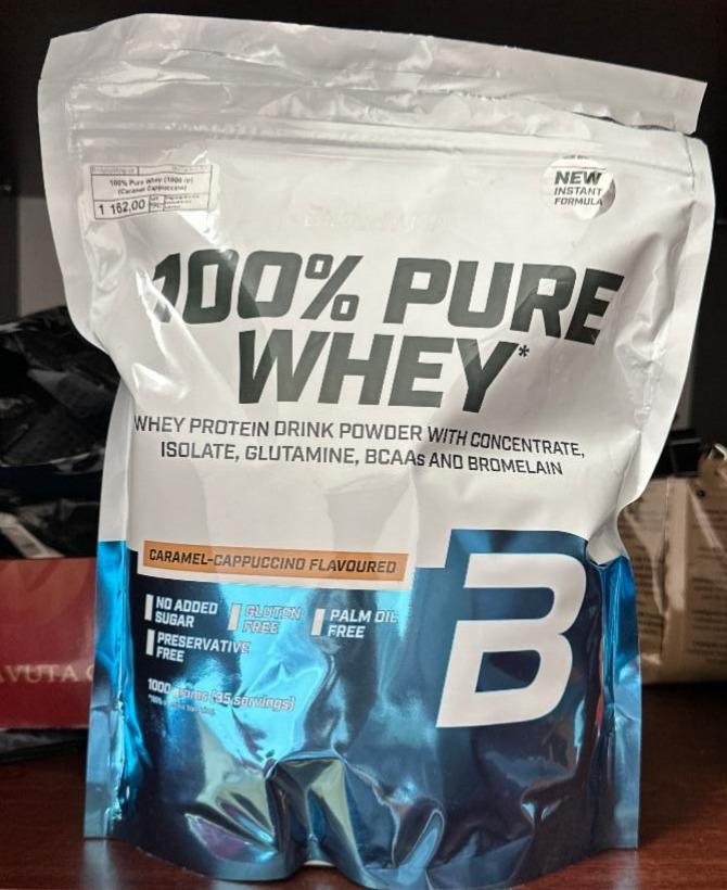 Fotografie - 100% pure whey caramel cappuccino flavoured BiotechUSA